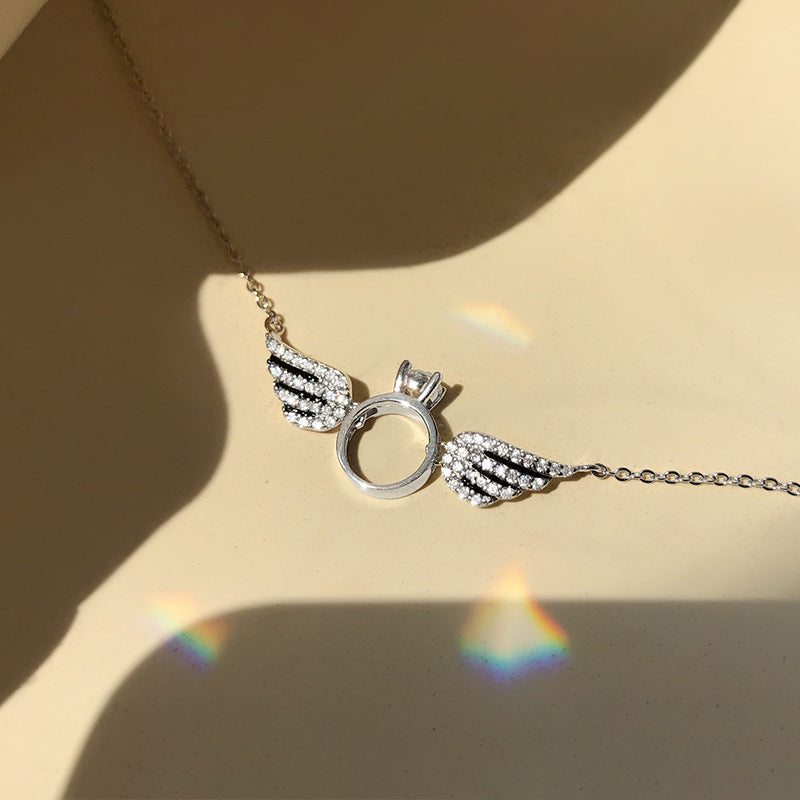 Ring with clearance wings necklace